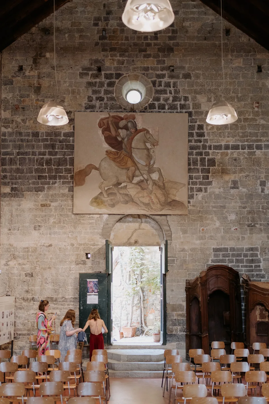 The stone hall with the chairs ready for the ceremony in Cervo